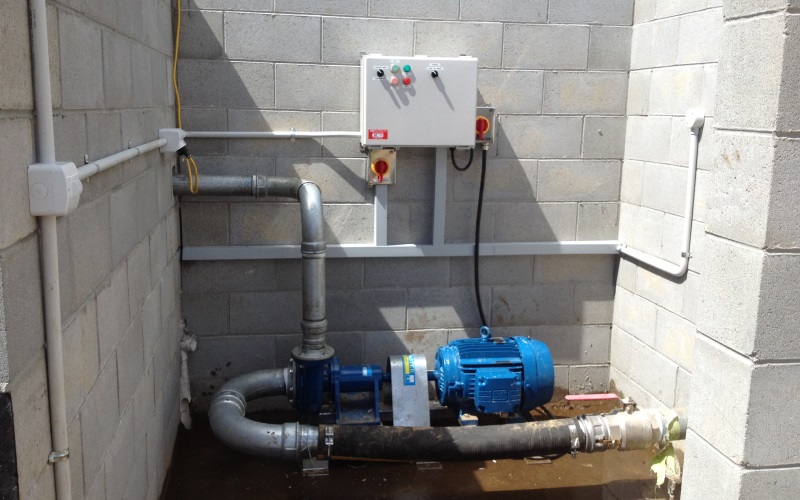 Pumping station beside storage tank uses Yardmaster horizontal mount pump been flood feed